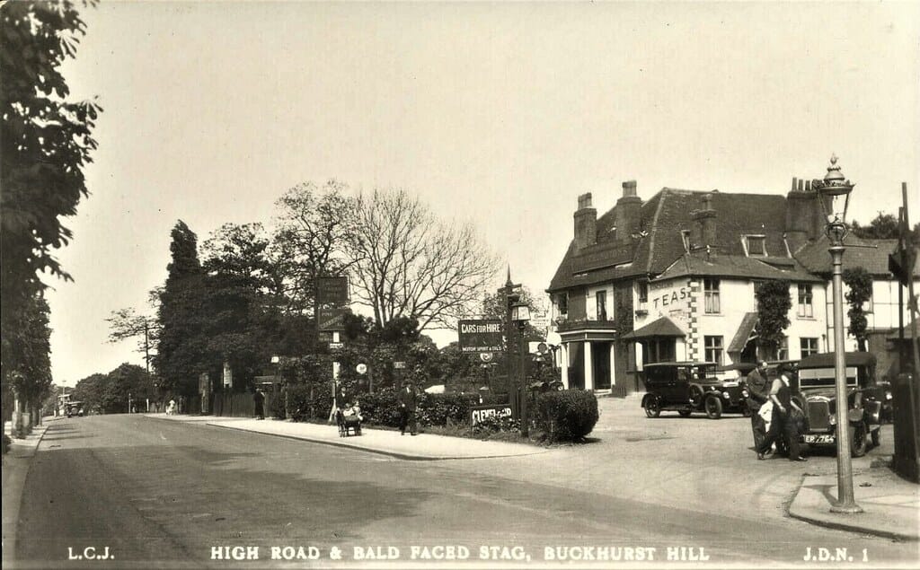 BUCKHURST HILL Essex High Road and Bald Faced Stag Inn with CARS parked RP