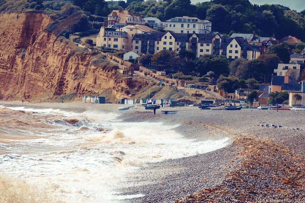Budleigh Salterton is a seaside town on the coast in East Devon, England, 15 miles (24 km) south-east of Exeter. It lies within the East Devon Area of Outstanding Natural Beauty