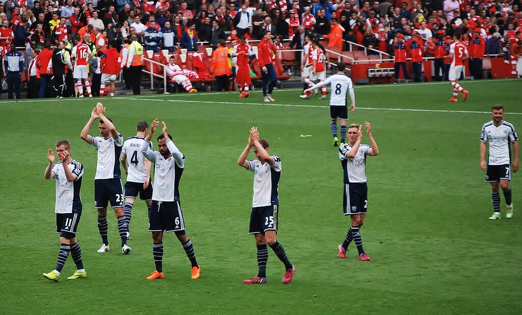 West Bromwich Albion players applauding the magnificent traveling Baggies fans at the end of the season match at the Emirates Stadium